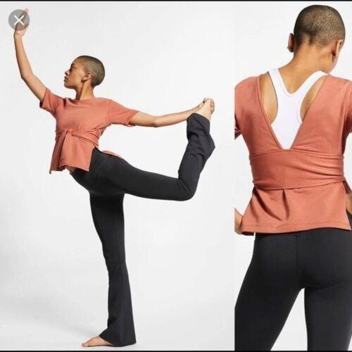 Original Nike Studio Yoga Wrap Top with pocket for your phone Women s Fashion Activewear on Carousell