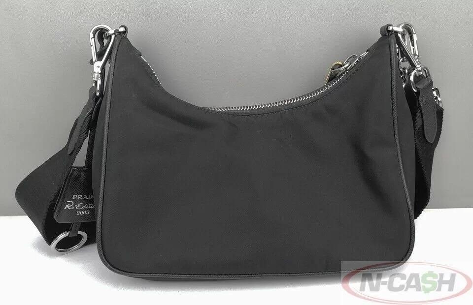 PRADA 1BH204 Re-Edition Nero Bag with Pouch (Category: Luxury Bags & Wallets) located in Quezon City. Submitted by luxury_by_n-cash (Listing ID 1187718716, Image 2). Description: N-Cash Pawnshop "Instant Cash for Bags, Watches, Cars, and Electronics" https://www.ncash-pawnshop-philippines.com/ PRADA 1BH204 Re-Edition Nero Bag with Pouch PRE-OWNED Brand: PRADA Measures: 8.5″ L x 4.5″ H x 2.5″ D (approx) Material: Black Nylon with Leather Trim 16″ 