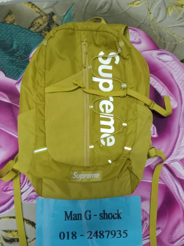 Supreme SS17 acid green backpack, Men's Fashion, Bags, Backpacks on  Carousell