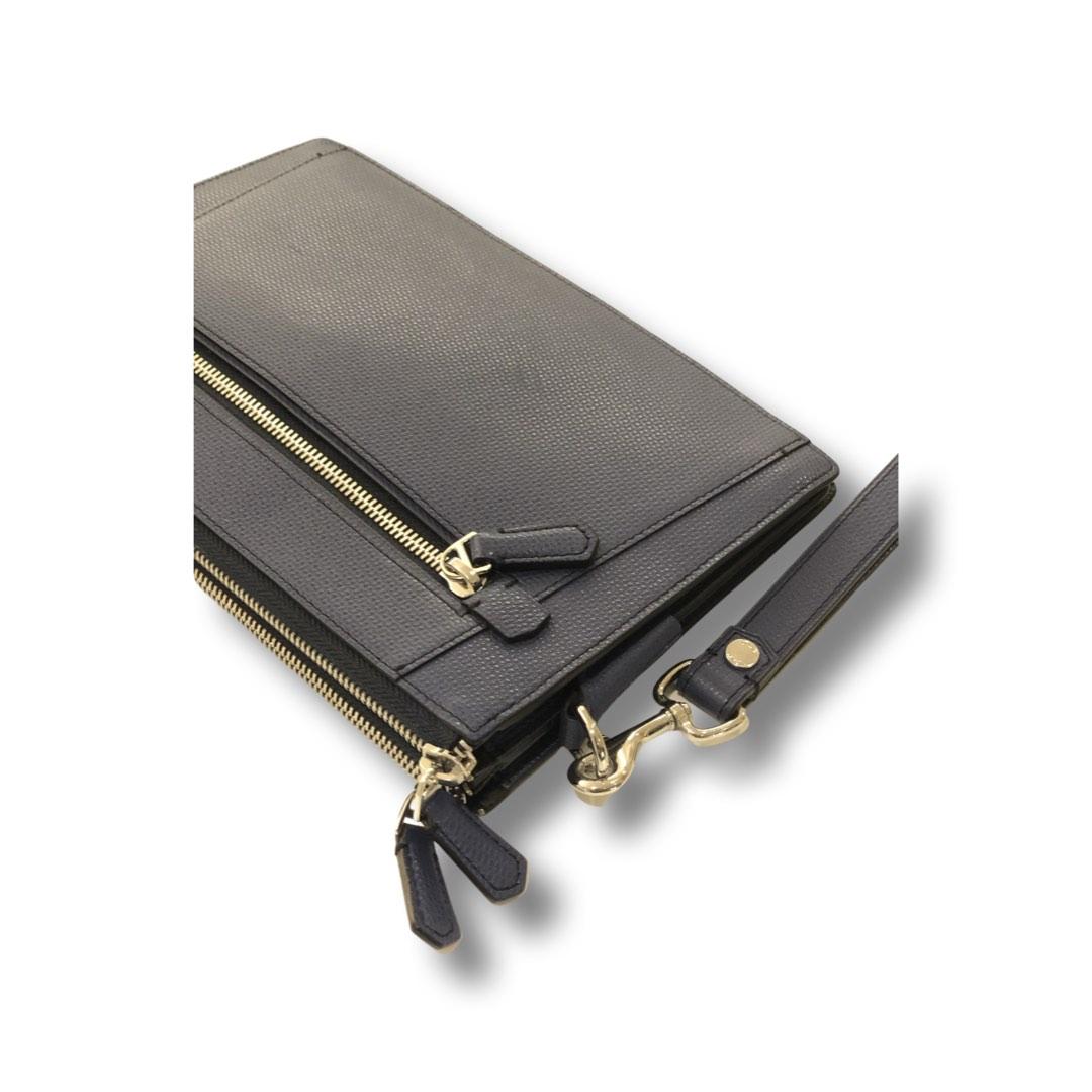 Tumi hotsell men clutch