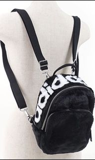 Adidas faux fur backpack sales