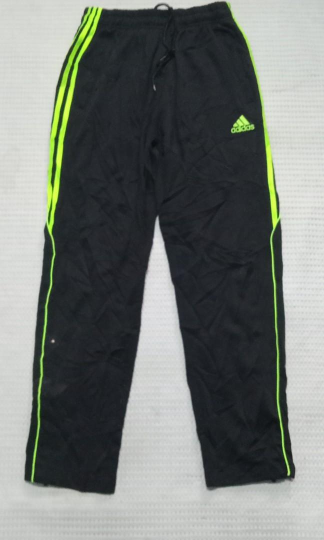 Black and neon green adidas pants on sale