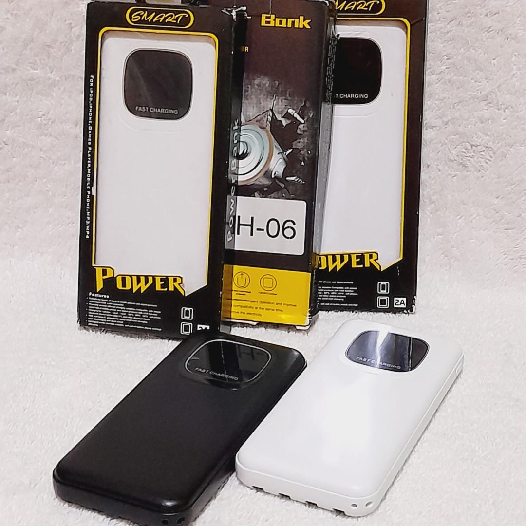 Built in cords powerbank (Category: Batteries & Power Banks) located in Paranaque City. Submitted by audioaddict0517 (Listing ID 1182607662, Image 2). Description: Specification: Item Name: Built in Cable Power Bank with LED Digital Display Capacity: 30000mAh Input: 5V/2A Output: 5V/2A Material:ABS Plastic.