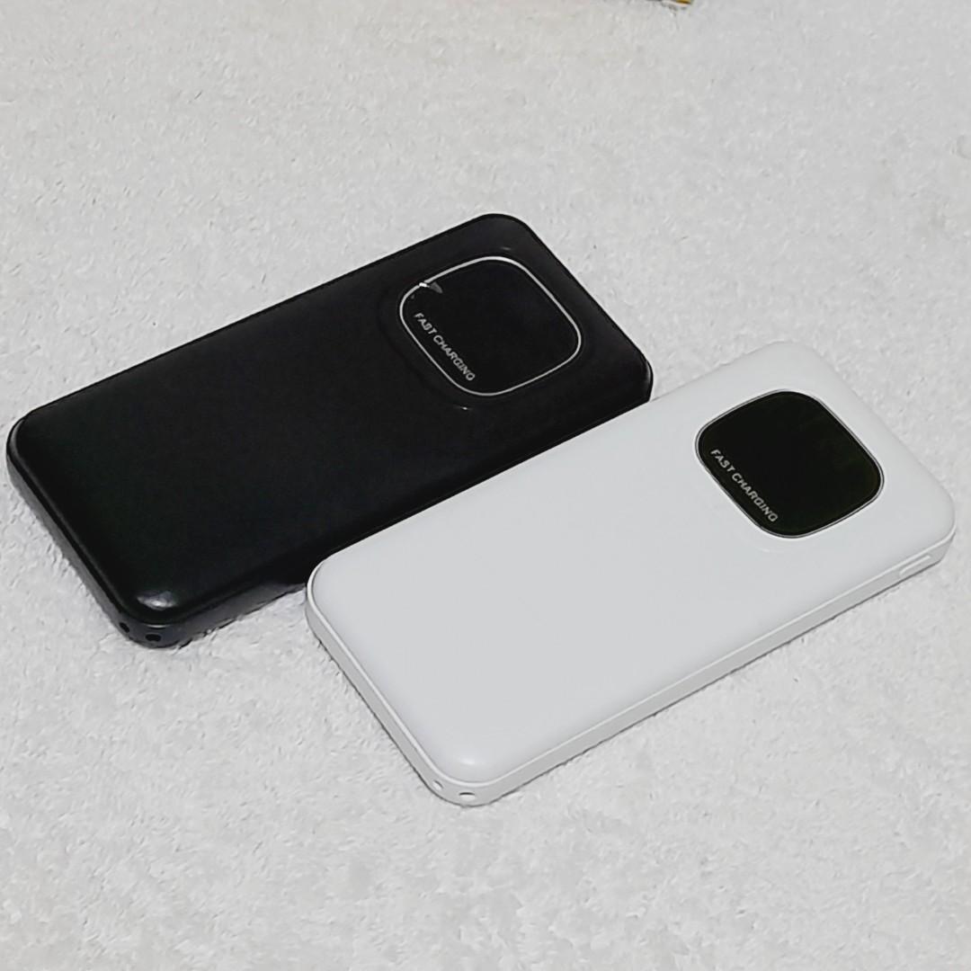 Built in cords powerbank (Category: Batteries & Power Banks) located in Paranaque City. Submitted by audioaddict0517 (Listing ID 1182607662, Image 3). Description: Specification: Item Name: Built in Cable Power Bank with LED Digital Display Capacity: 30000mAh Input: 5V/2A Output: 5V/2A Material:ABS Plastic.