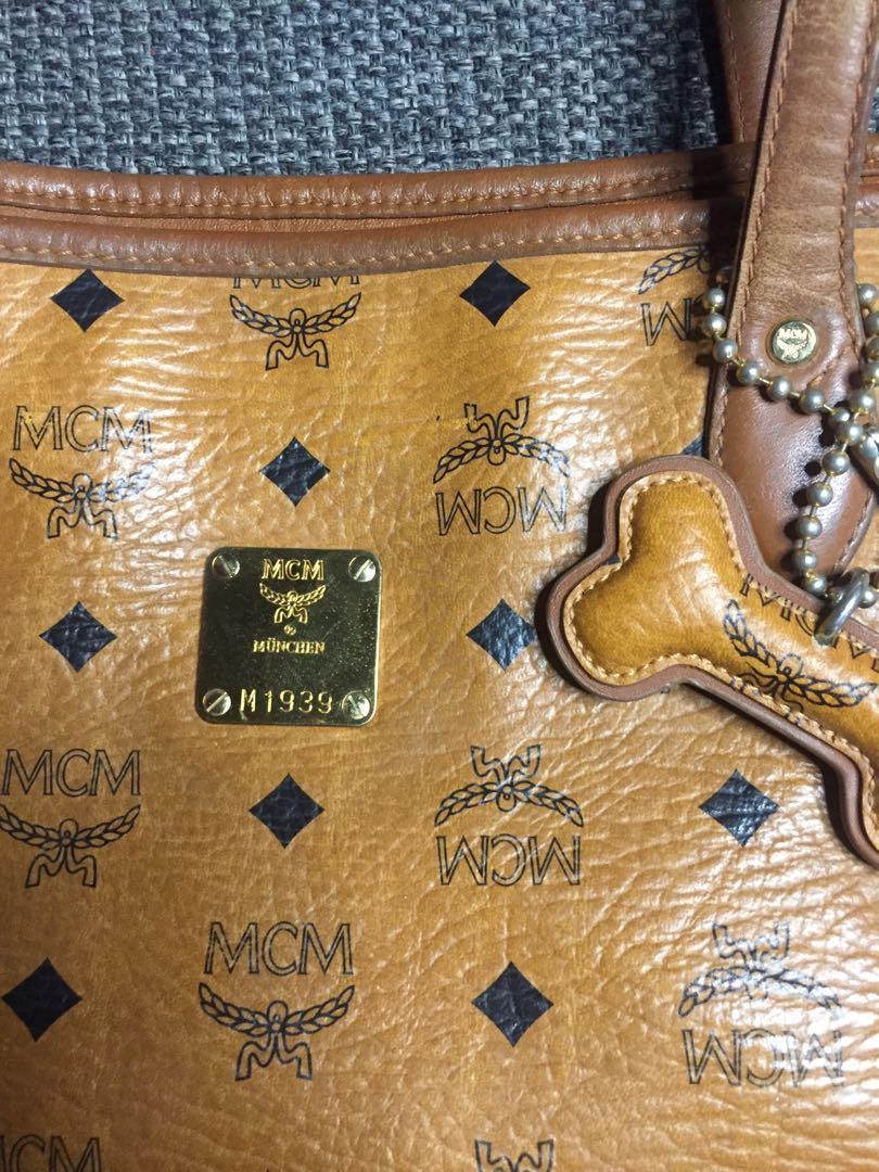 MCM Dogbone Tote (Category: Luxury Bags & Wallets) located in Baguio. Submitted by BagstacularbyJCT (Listing ID 1182598469, Image 3). Description: MCM Tote in Cognac Visettos. With dogbone charm. Details in pics. .
