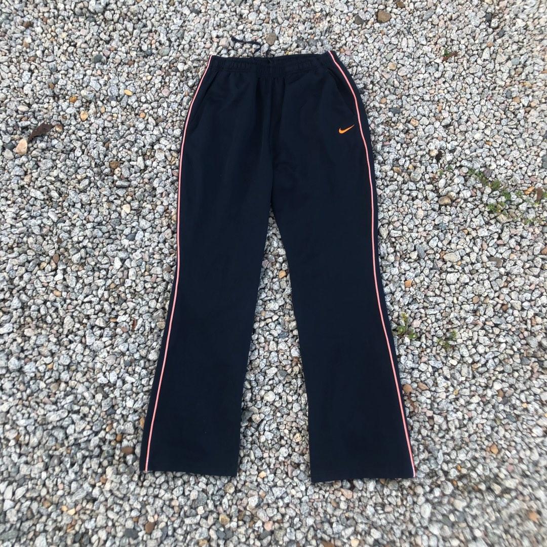 Authentic‼️Nike - Baggy Track Pants, Men's Fashion, Bottoms, Joggers on  Carousell