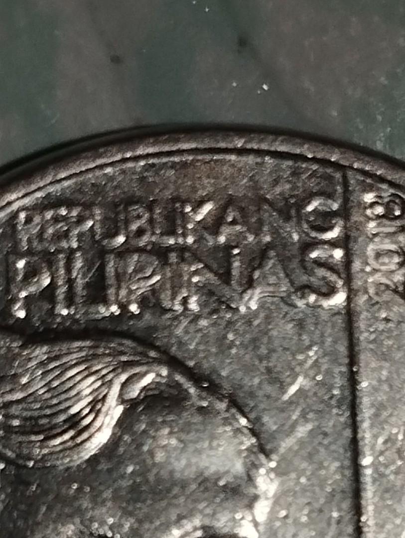2018 1peso rare error coin (Category: Currency) located in Paranaque City. Submitted by agacer49-42612 (Listing ID 1187975025, Image 3). Description: 2018 1peso error coin NGC rare error coin extra metal back 2 back extra metal sa Pilipinas at sa letter (P) sa back sa flower extra metal.