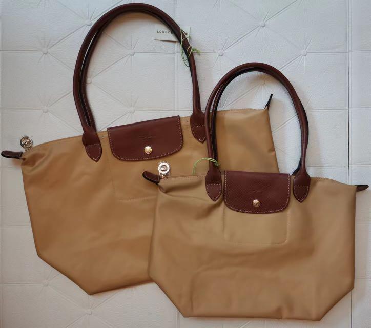 https://media.karousell.com/media/photos/products/2022/9/30/longchamp_le_pliage_long_handl_1664513161_d17c3e7c_progressive.jpg