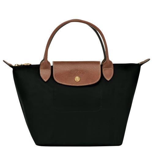 Longchamp Le Pliage Small Short Handle (Category: Luxury Bags & Wallets) located in San Juan City. Submitted by chicqui (Listing ID 1187858401, Image 2). Description: Reference : L1621089001 Dimensions : 9.1 in (L) x 8.7 in (H) x 5.5 in (W) Material : Recycled polyamide canvas with inside coating Metallic Hardware : Gold color Trimming : Russian leather (cowhide) Weight : 178 g EXTERIOR DETAILS Handle Height : 9 cm / 3.5 in Closing : Zipped and s