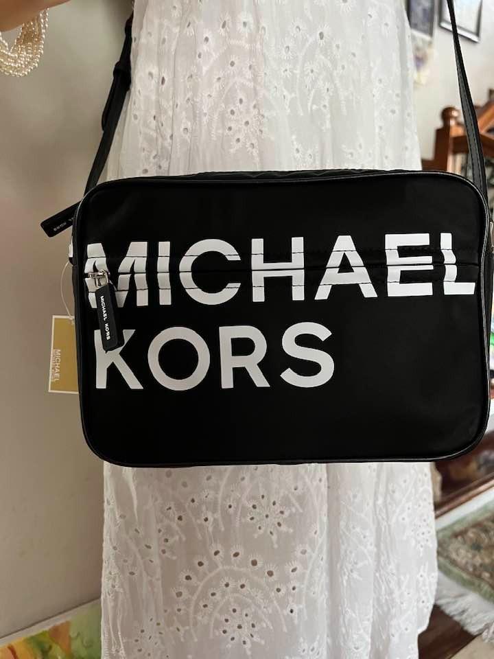 SALE Michael Kors Sport Large EW Black Nylon Crossbody Bag, Women's  Fashion, Bags & Wallets, Cross-body Bags on Carousell