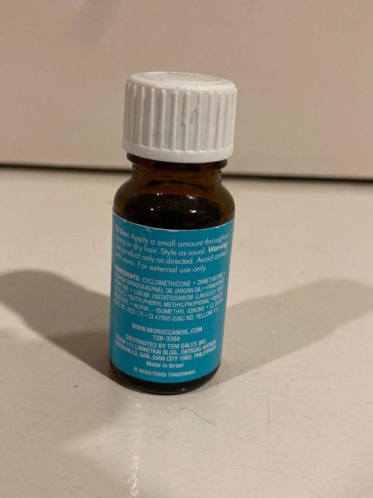 Moroccan Oil for Hair (Category: Hair) located in Paranaque City. Submitted by shopmyquahloset (Listing ID 1187920088, Image 3). Description: Half of the bottle used, around 5ml left but you dont need a lot per use since its a hair oil. Opened November 2021.