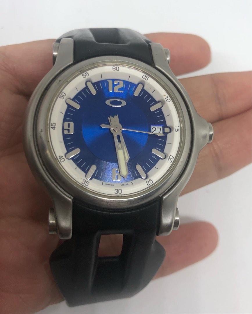 Oakley Watch Swiss Made Unisex Quartz 34 35mm size rubber bracelet unit and presentation box only for only 12.8k negotiable very good condition