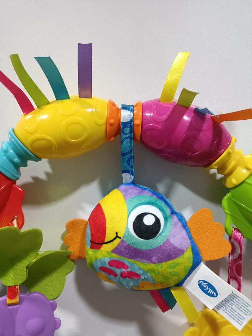 Playgro toucan top musical play arch