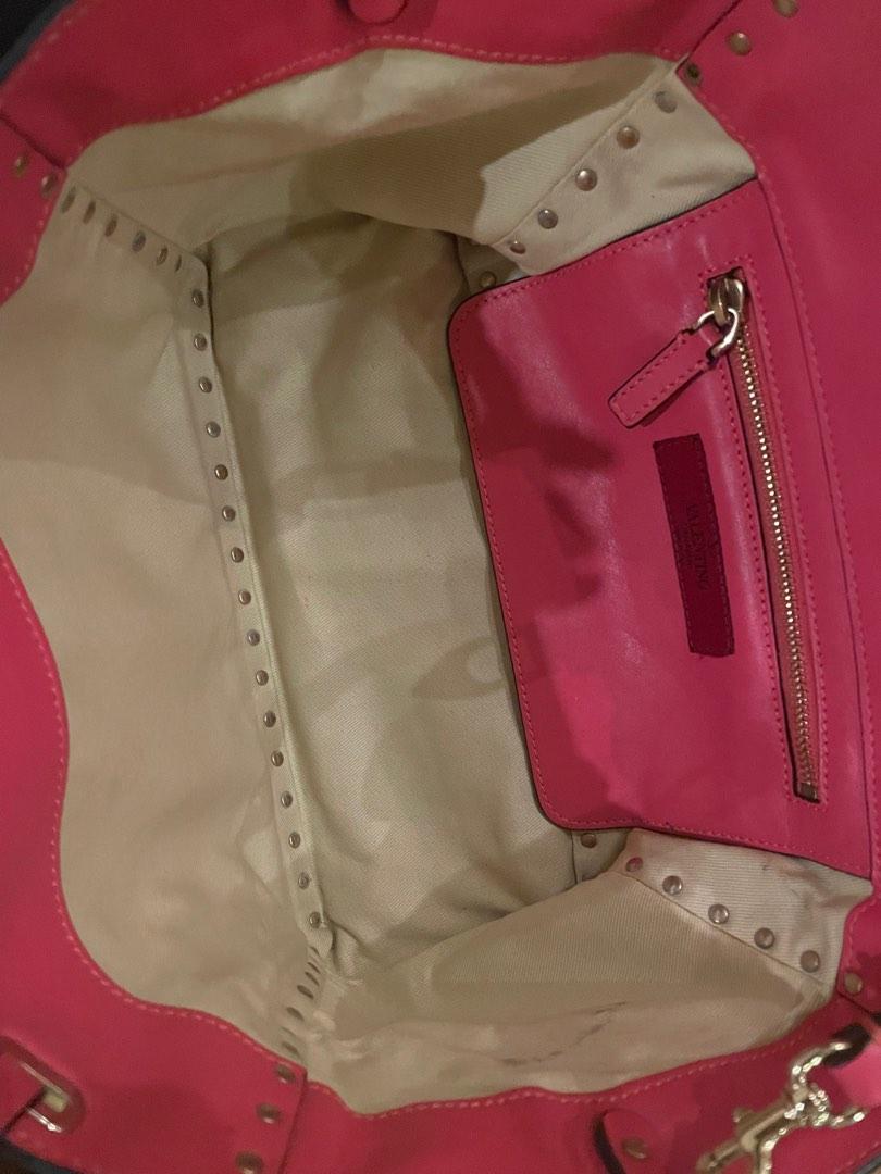 Authentic Valentino Rockstud (Category: Luxury Bags & Wallets) located in Makati City. Submitted by closetcleanup2022 (Listing ID 1182781614, Image 2). Description: Guaranteed authentic Valentino rockstud bag size small can be used as shoulder, handbag or cross body. Excellent condition 9/10 only signs of use Comes with strap .