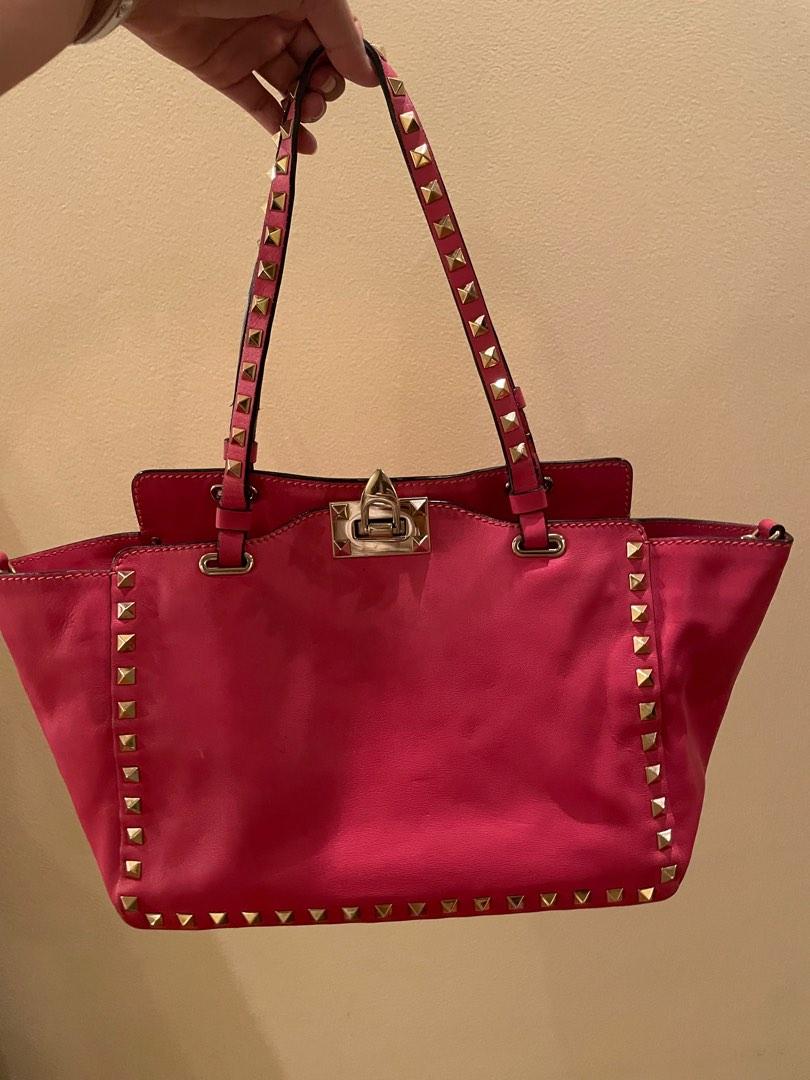 Authentic Valentino Rockstud (Category: Luxury Bags & Wallets) located in Makati City. Submitted by closetcleanup2022 (Listing ID 1182781614, Image 1). Description: Guaranteed authentic Valentino rockstud bag size small can be used as shoulder, handbag or cross body. Excellent condition 9/10 only signs of use Comes with strap .