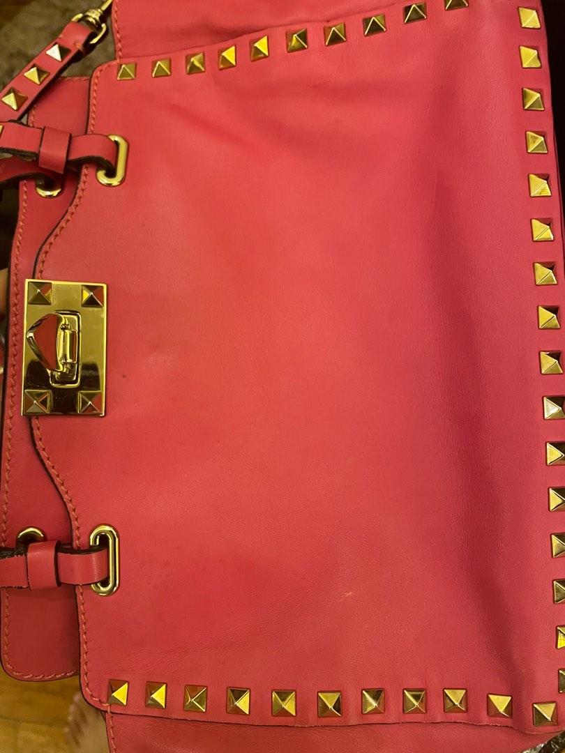 Authentic Valentino Rockstud (Category: Luxury Bags & Wallets) located in Makati City. Submitted by closetcleanup2022 (Listing ID 1182781614, Image 3). Description: Guaranteed authentic Valentino rockstud bag size small can be used as shoulder, handbag or cross body. Excellent condition 9/10 only signs of use Comes with strap .