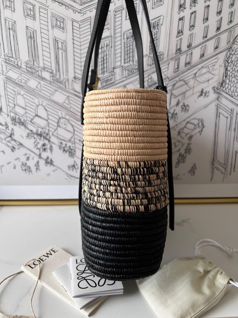 + Paula's Ibiza leather-trimmed raffia bucket bag