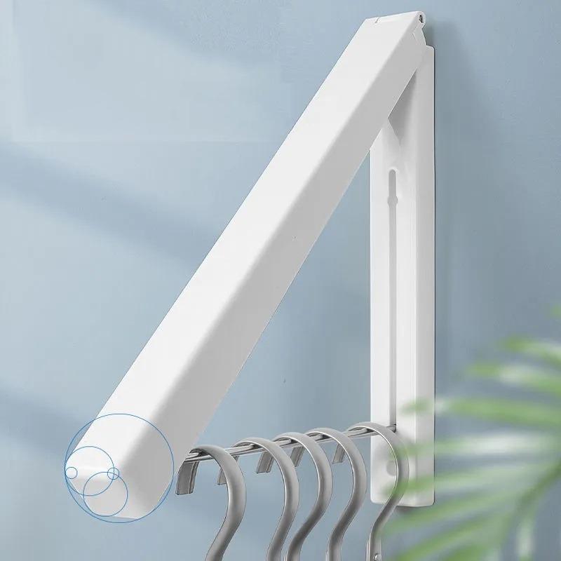 Invisible folding clothes drying rack wall-mounted free punch telescopic  clothes drying rod bathroom drying clothes, Furniture  Home Living,  Cleaning  Homecare Supplies, Cleaning Tools  Supplies on Carousell