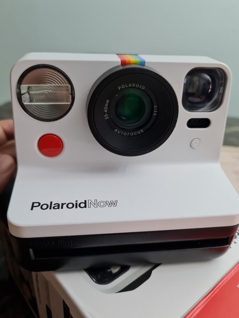 Polaroid Now white camera, Photography, Cameras on Carousell