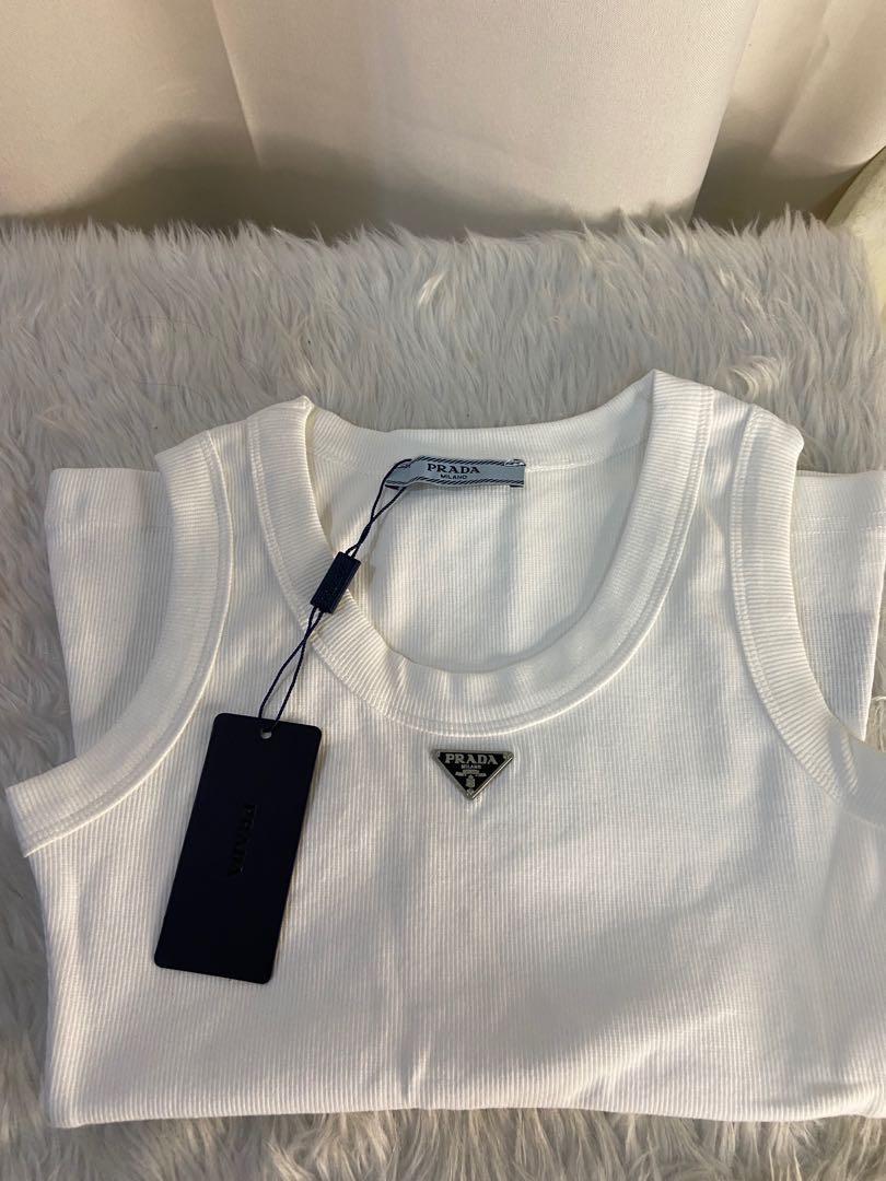 Prada white tank top preorder (Category: Luxury Apparel) located in Mandaluyong City. Submitted by japanandsingaporeluxepreloved (Listing ID 1163217819, Image 3). Description: Can be tucked in for a cropped look All sizes are available for preorder Diclaimer: we are not associated with the brands that are linked and stated with this post. All copyrights are reserved to its brandowners . No infringement intended . Black on hand .