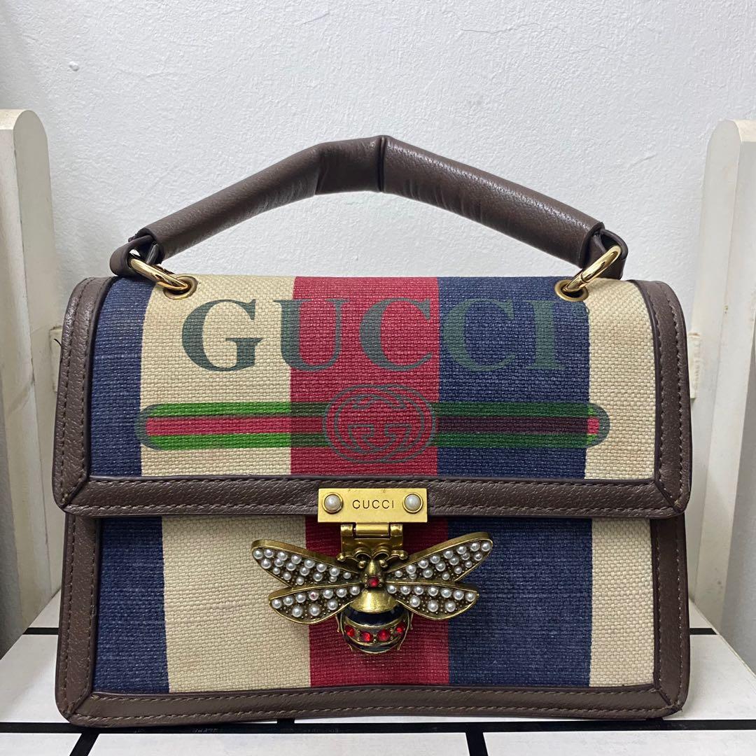 Gucci bag shop with bee clasp