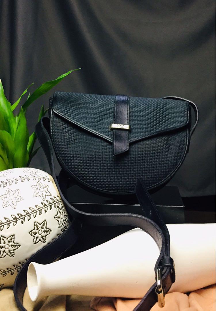 YSL Rive Gauche by Tom Ford (Category: Luxury Bags & Wallets) located in Baguio. Submitted by BagstacularbyJCT (Listing ID 1182893908, Image 1). Description: 90's YSL sling in knitted material, leather trims and straps, and silver hardware. Height 6.5 in /16.5 cm Width 8.86 in / 22.5 cm Depth 1.97 in / 5 cm reference: https://www.grailed.com/listings/37131084-vintage-x-ysl-rive-gauche-by-tom-ford-x-yves-saint-laurent-90s-ysl-yves-saint-laurent-cr