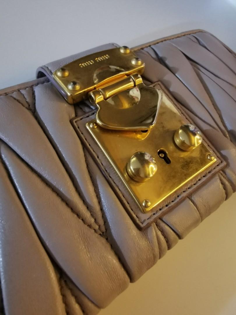 Authentic Miu Miu long wallet (Category: Luxury Bags & Wallets) located in Malabon City. Submitted by vintagemom (Listing ID 1182955266, Image 2). Description: Well used pls see minor flaws.