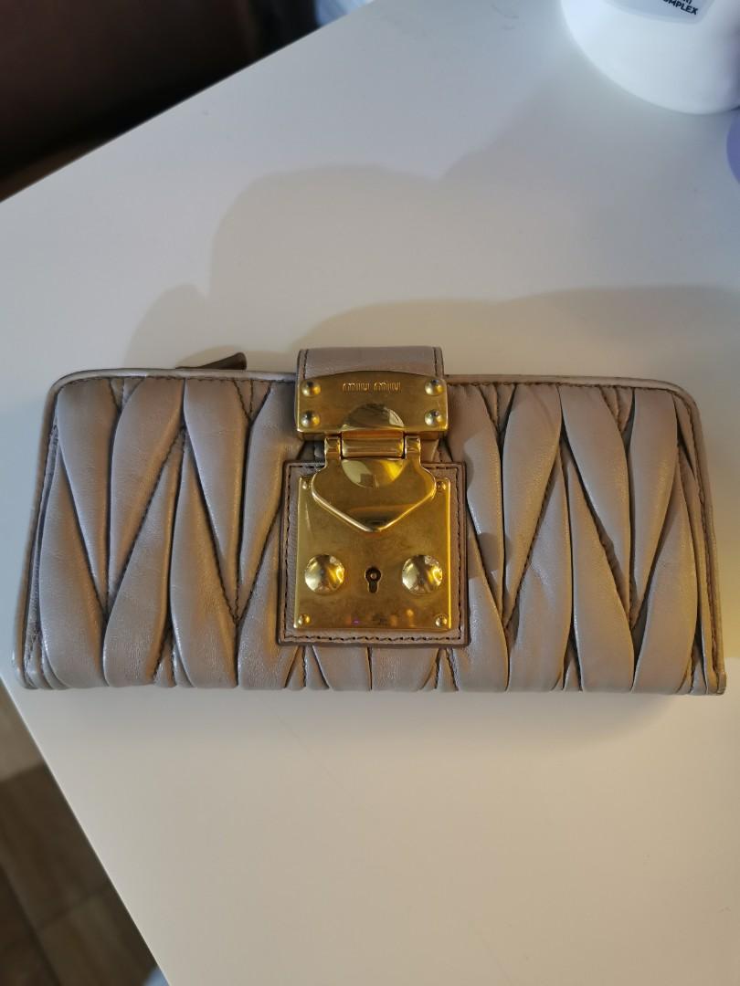 Authentic Miu Miu long wallet (Category: Luxury Bags & Wallets) located in Malabon City. Submitted by vintagemom (Listing ID 1182955266, Image 1). Description: Well used pls see minor flaws.