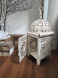 Decorative metal bird cage and heavy coral glass display