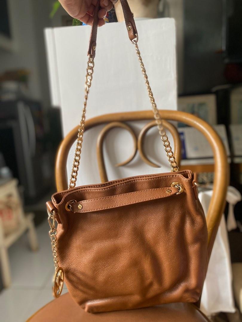 MK bag (Category: Luxury Bags & Wallets) located in Quezon City. Submitted by jujoo (Listing ID 1182999315, Image 2). Description: Michael Kors jet set chain medium shoulder bag Brown soft slouchy leather, top chain with leather handles, adjustable leather shoulder strap, interior zip pocket, gold hardware Rank B With dustbag.