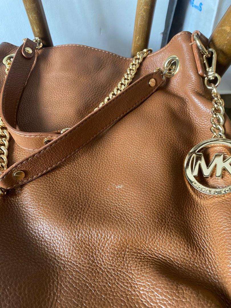 MK bag (Category: Luxury Bags & Wallets) located in Quezon City. Submitted by jujoo (Listing ID 1182999315, Image 3). Description: Michael Kors jet set chain medium shoulder bag Brown soft slouchy leather, top chain with leather handles, adjustable leather shoulder strap, interior zip pocket, gold hardware Rank B With dustbag.