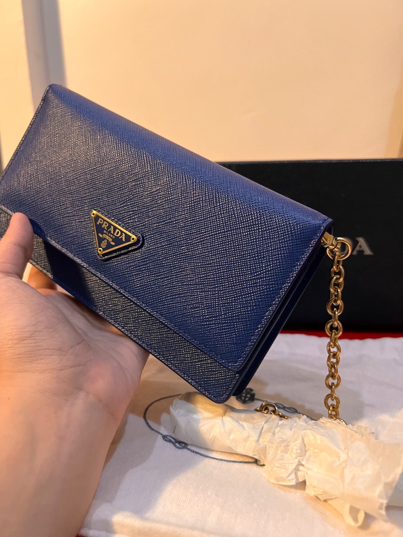 Prada wallet on chain in blue. 100% authentic. Came with original dusk bag  and receipt., Luxury, Bags & Wallets on Carousell