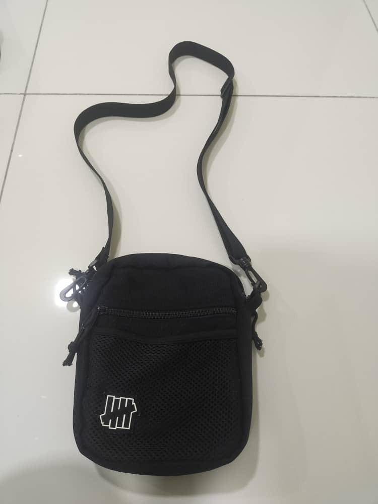 Undefeated sling bag store