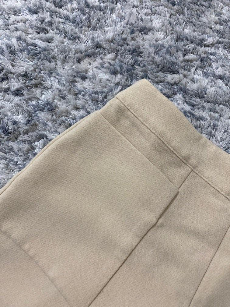 Beige high waist shorts (Category: Shorts) located in Mandaluyong City. Submitted by tenohthree (Listing ID 1183208451, Image 3). Description: Zipped behind, quality stretchy material. Waist is 26-28.
