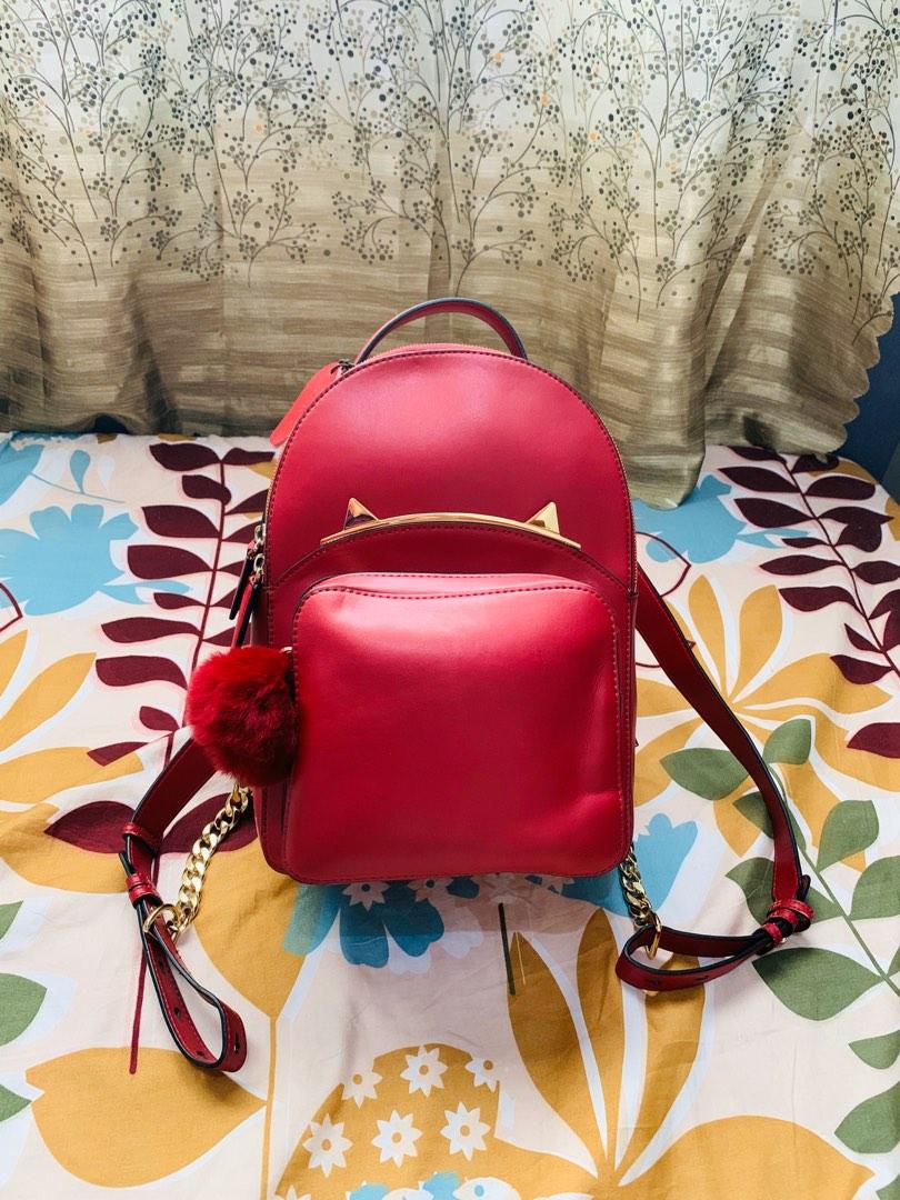 Dissona, Bags, Genuine Leather Mini Backpack With Plush Ball