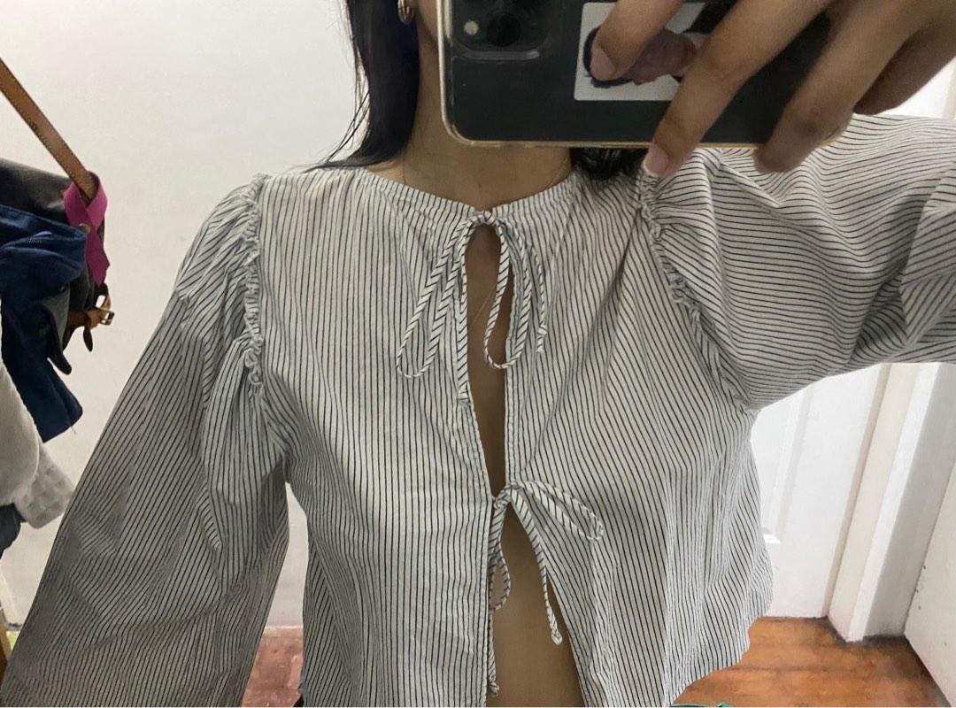 Pinstripe tie top (Category: Longsleeves) located in Mandaluyong City. Submitted by tenohthree (Listing ID 1183212390, Image 2). Description: Brand: june & hudson Tie it at the front, tie it at the back, tie it however the fuck you want. It’s a cute top for brunches or wear it sa office if you like. Fits s-m.