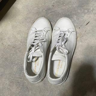 WOMAN by Common Projects