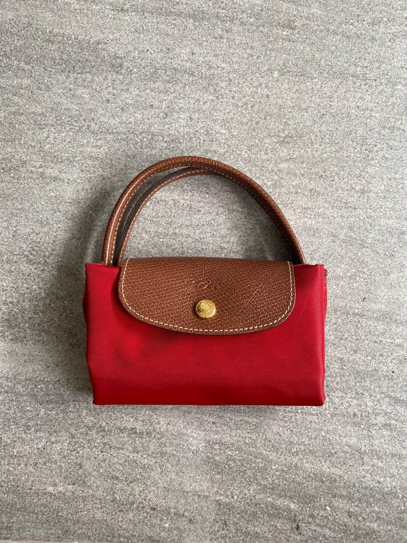 Longchamp Le Pliage Small (Category: Shoulder Bags) located in Quezon City. Submitted by hahaloserr (Listing ID 1183349289, Image 1). Description: Super like new, used only a few times. Just a little creased from being kept in storage Current srp is 7.7k in Rustans RFS: Decluttering, not my style anymore.