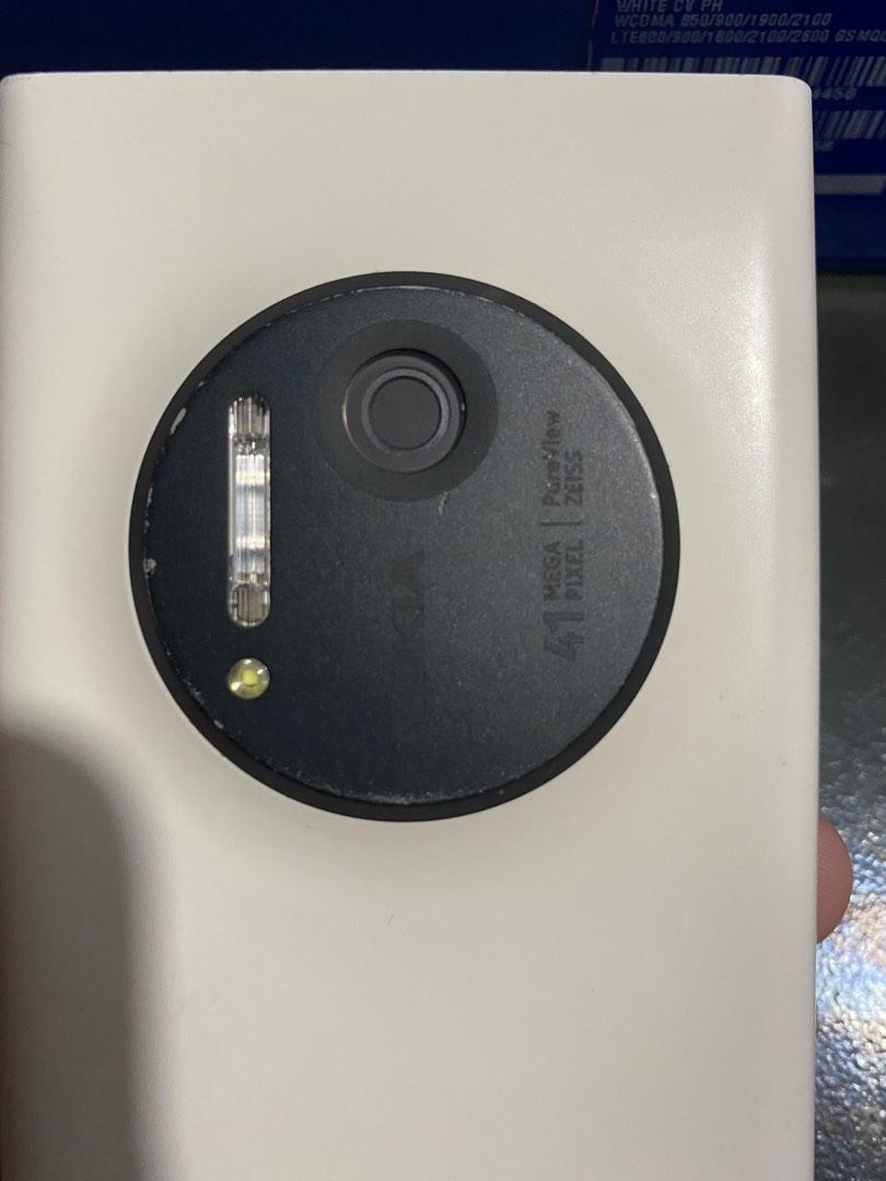 Nokia Lumia 1020 41MP 32GB (White) (Category: Early Generation Mobile Phones) located in Baguio. Submitted by merv.corner (Listing ID 1183477241, Image 1). Description: Nokia Lumia 1020 41MP 32GB (White) Also known as Nokia 909 Pureview Originally from smart but already openline after end contract. With signs of wear like scratches on polycarbonate back housing cover, visible cracks and dents also some fades on the camera lens frame/cover (refer 
