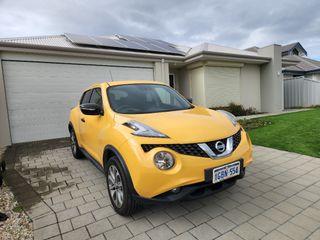 Yellow Nissan Juke Turbo 2016