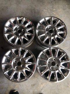 14” Ford Lynx with rays centercap mags used 4Holes pcd 100 sold as 4