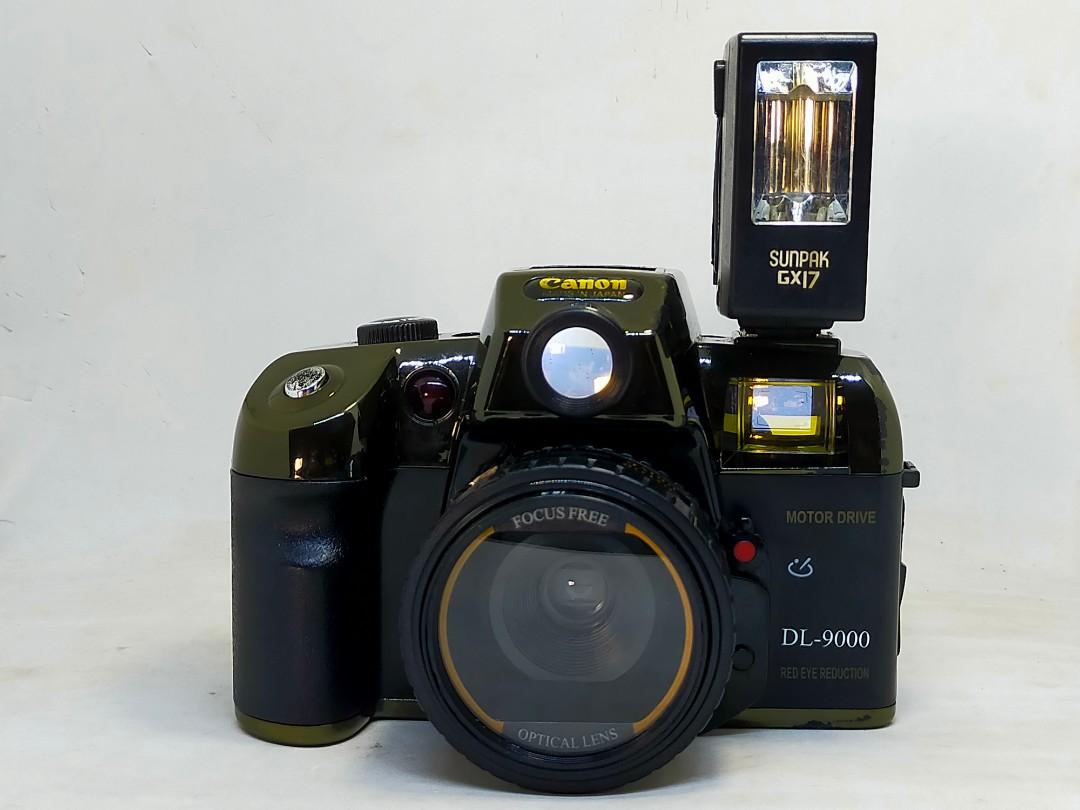 canon dl9000 motor drive camera with 50mm sunpak external flash