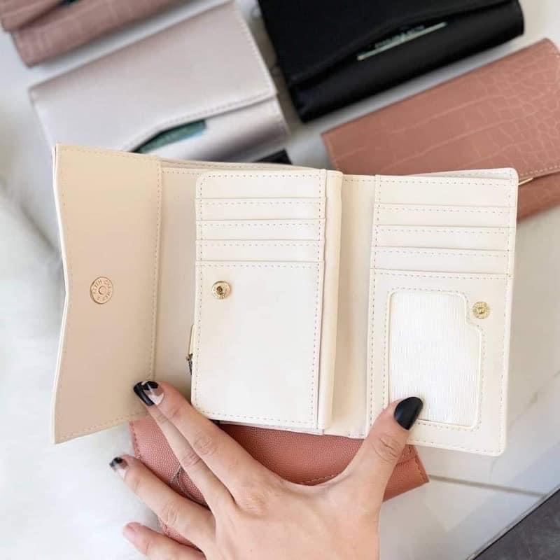 Charles & Keith Trifold Wallet in Black (Category: Wallets & Card holders) located in Taguig. Submitted by mnl.direct (Listing ID 1183683299, Image 2). Description: Comes with box Perfect for girl RS: P850 each minimum of 2pcs Retail P900.