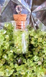 Natural Crystal Peridot chips in a 26.5mm bottle