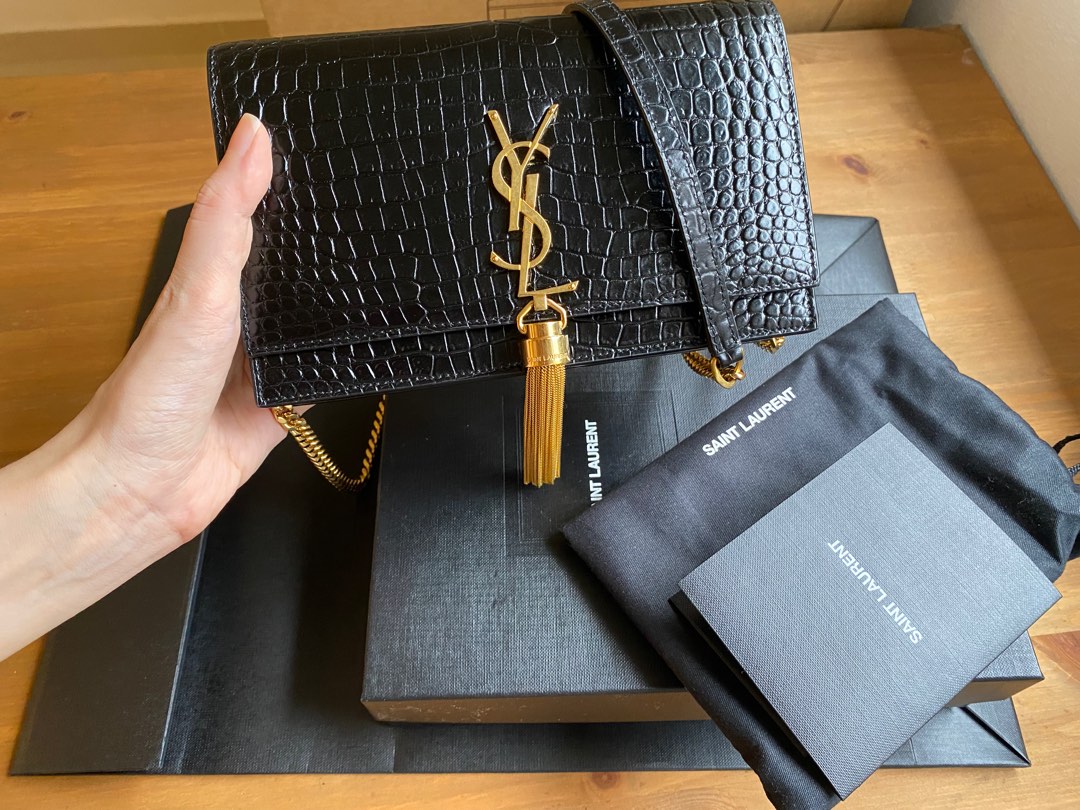 Ysl gold tassel discount
