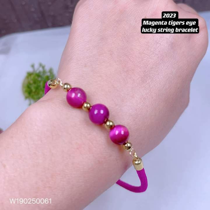 2023 magenta tiger eye lucky string bracelet (Category: Bracelets) located in Manila. Submitted by delynonlineshopping_ (Listing ID 1206803089, Image 3). Description: New new new designs💥💥💥💥 🌈2023 magenta tiger eye lucky string bracelet🌈 ✅quality: 👉japan cord 👉magenta tigers eye 👉balls: stainless gold 👉rabbit : thailan gold 👉tree of life: thailand gold ✅size: 👉bracelet : adjustable 👉balls :4mm 👉magenta tigers eye: 8mm 💎 Magenta tig