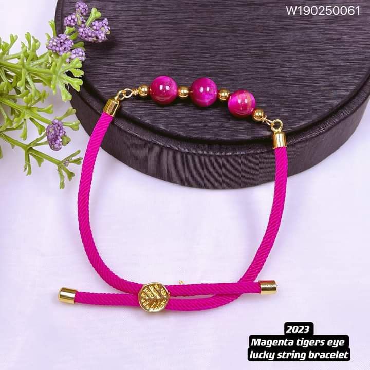 2023 magenta tiger eye lucky string bracelet (Category: Bracelets) located in Manila. Submitted by delynonlineshopping_ (Listing ID 1206803089, Image 1). Description: New new new designs💥💥💥💥 🌈2023 magenta tiger eye lucky string bracelet🌈 ✅quality: 👉japan cord 👉magenta tigers eye 👉balls: stainless gold 👉rabbit : thailan gold 👉tree of life: thailand gold ✅size: 👉bracelet : adjustable 👉balls :4mm 👉magenta tigers eye: 8mm 💎 Magenta tig