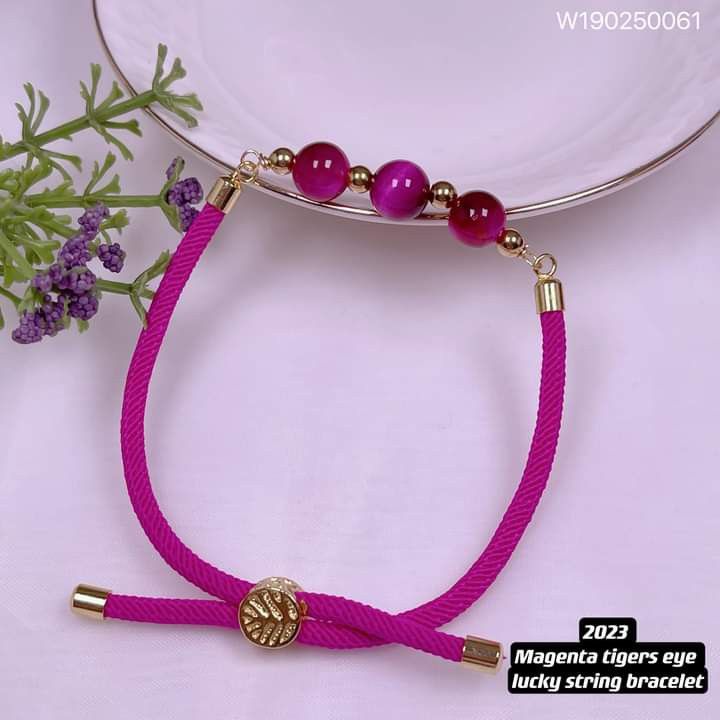 2023 magenta tiger eye lucky string bracelet (Category: Bracelets) located in Manila. Submitted by delynonlineshopping_ (Listing ID 1206803089, Image 2). Description: New new new designs💥💥💥💥 🌈2023 magenta tiger eye lucky string bracelet🌈 ✅quality: 👉japan cord 👉magenta tigers eye 👉balls: stainless gold 👉rabbit : thailan gold 👉tree of life: thailand gold ✅size: 👉bracelet : adjustable 👉balls :4mm 👉magenta tigers eye: 8mm 💎 Magenta tig