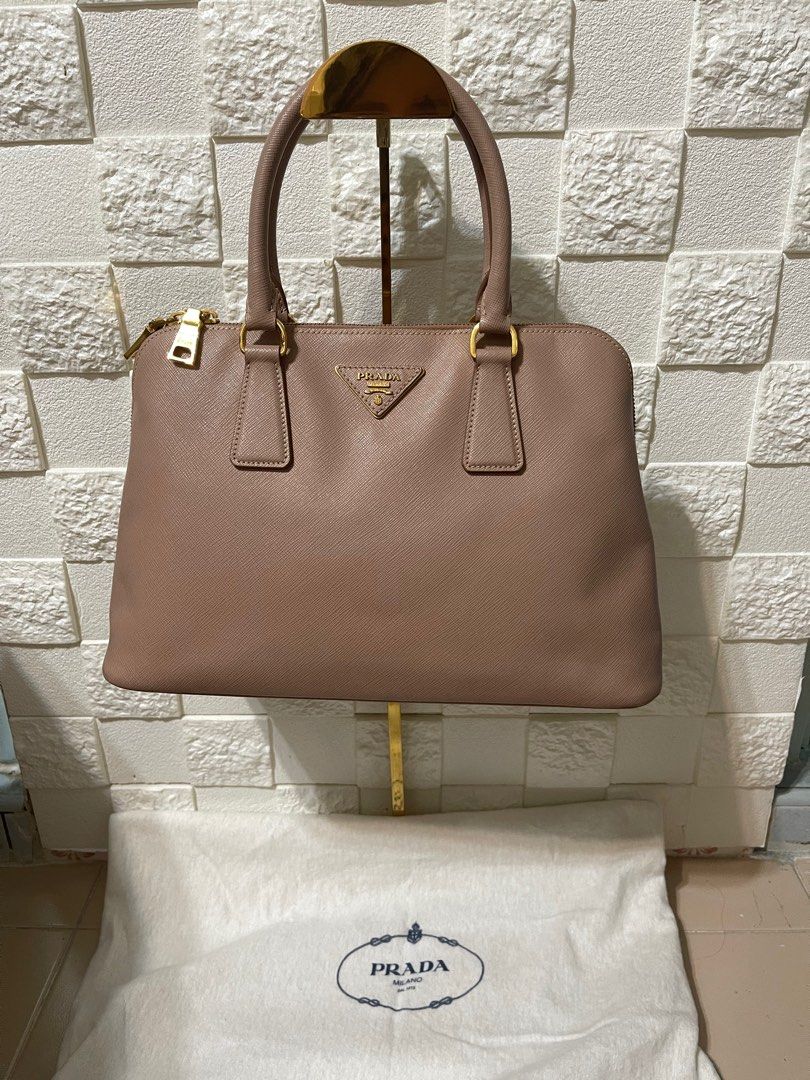 ?Authentic cheapest Prada saffiano leather promenade handbag in nude,  Luxury, Bags & Wallets on Carousell