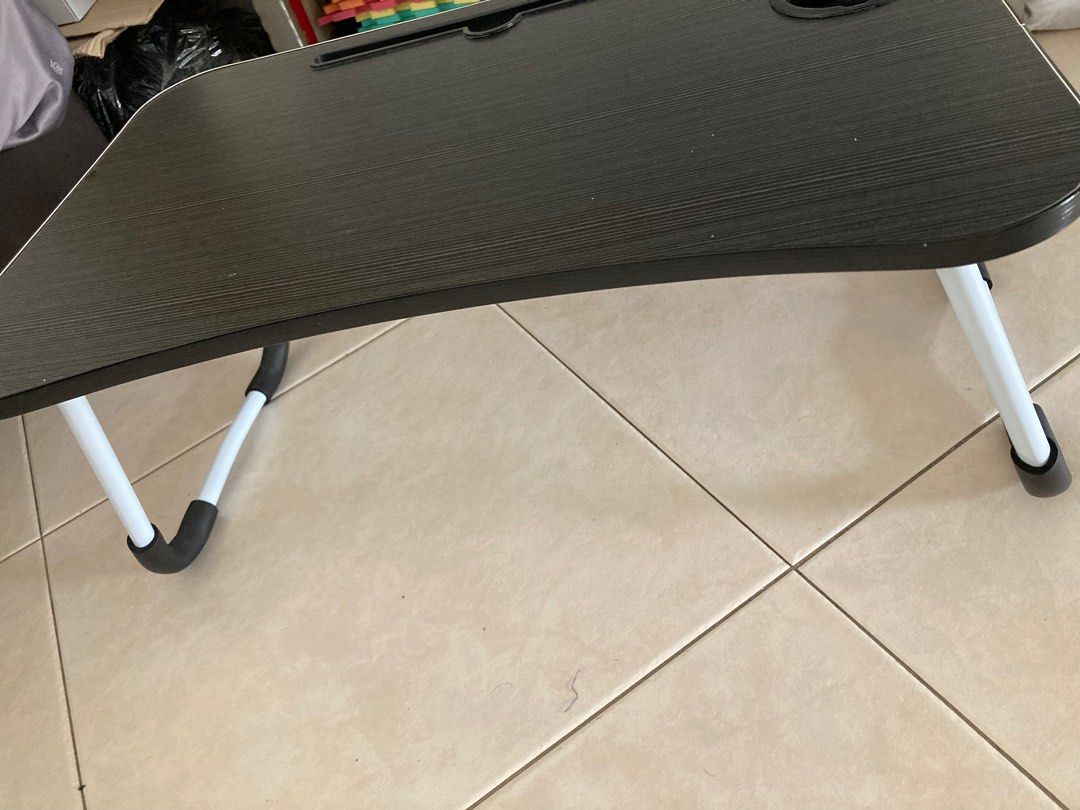 Bed Table (Category: Tables & Sets) located in Singapore. Submitted by carami (Listing ID 1206884831, Image 3). Description: Selling my bed table at very low price. Use but not abused. Like new! Bought at $15 but selling for only $9 .